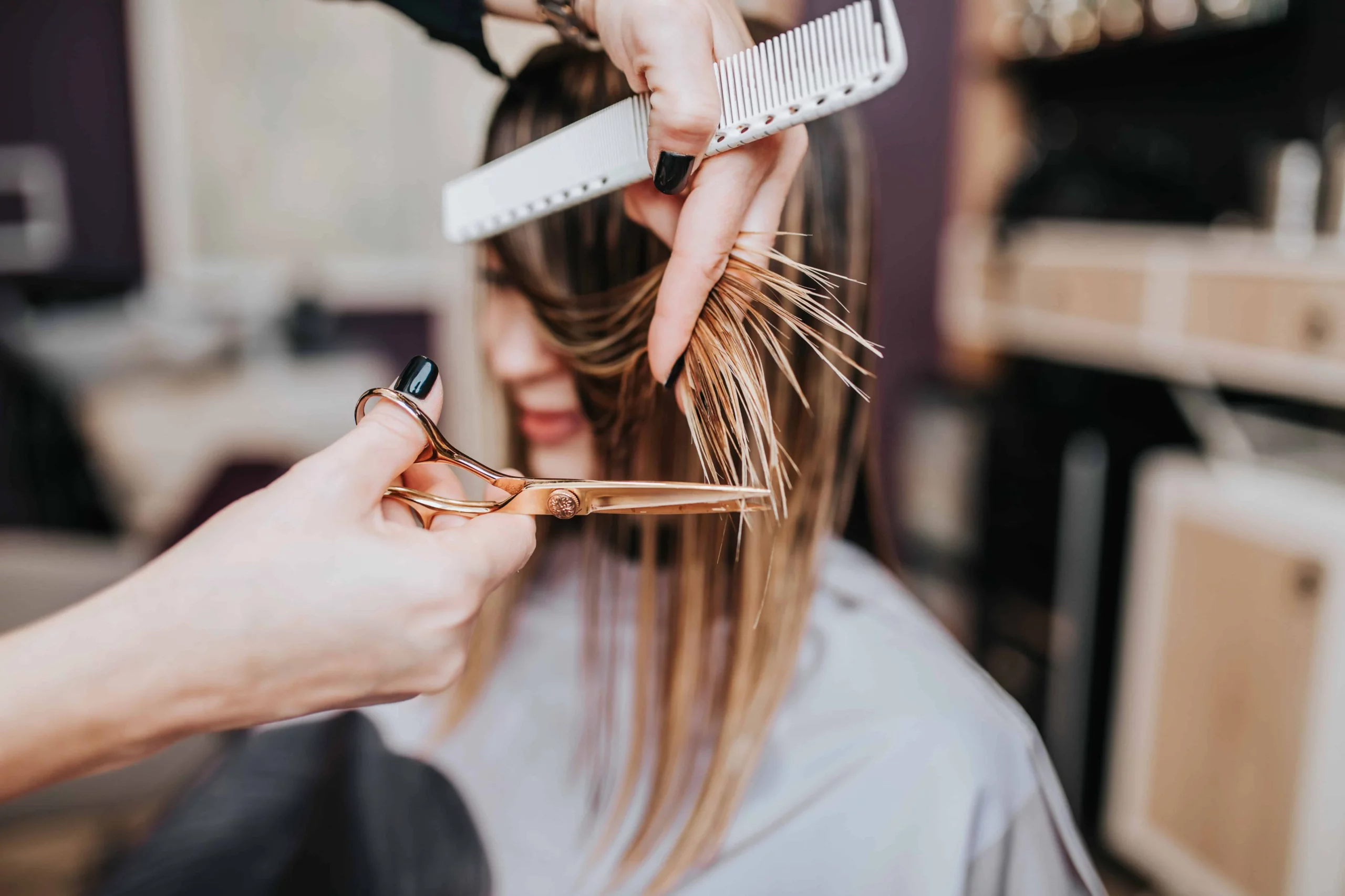 Woman getting trendy haircut