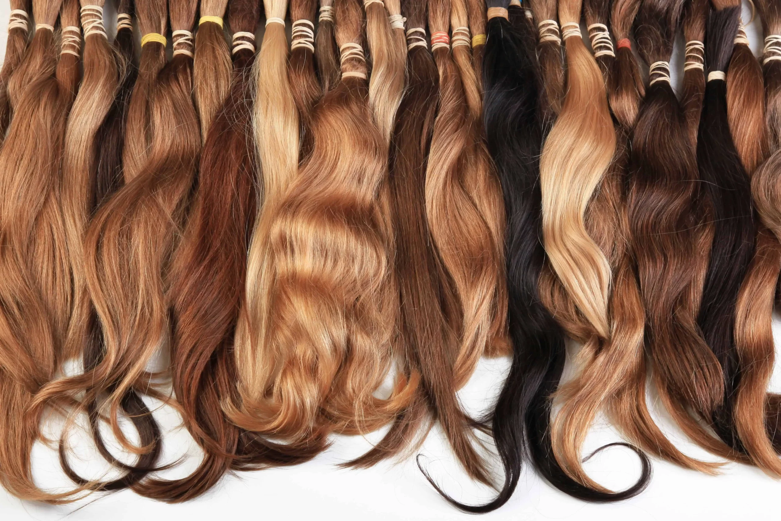 Various shades of clip-in hair extensions